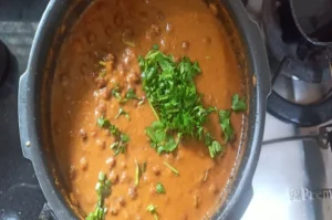 Chana masala garnished with coriander leaves